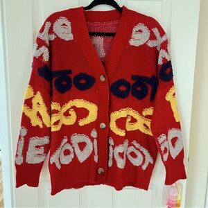 Women’s Oversized Red Cardigan Sweater With Front Button Closure And Patterns